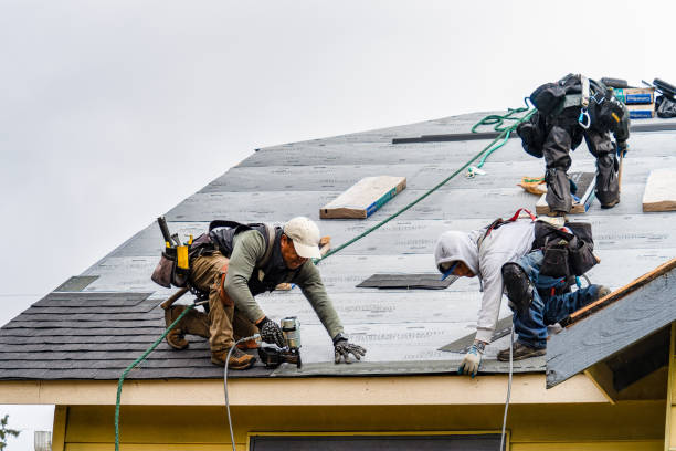 Professional Gutter Installation technician working in Rochester, VT